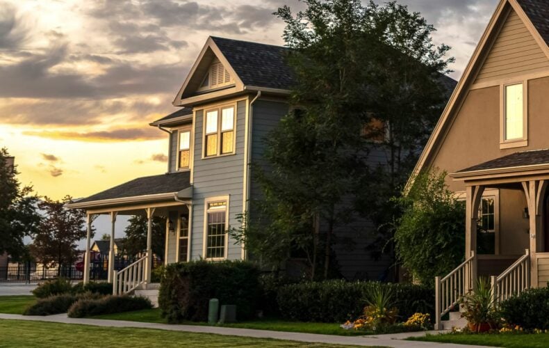 Square Row of houses on an estate at sunset