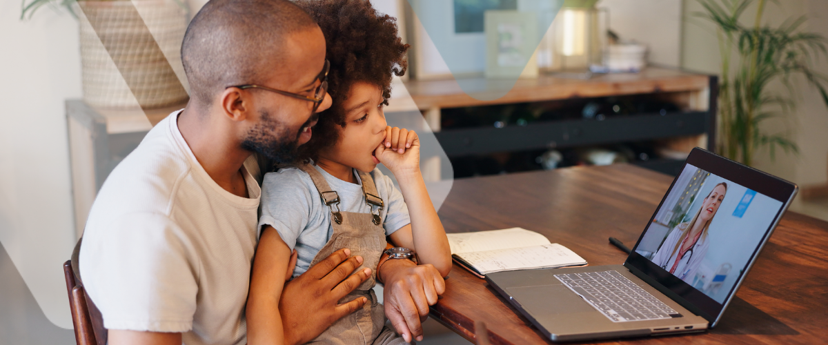 Parent and child attending a virtual healthcare appointment from home as part of a virtual care benefits plan